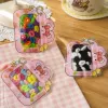The pink cartoon-shaped hair band bag contains colorful plush hair bands and black and white hair bands details Picture